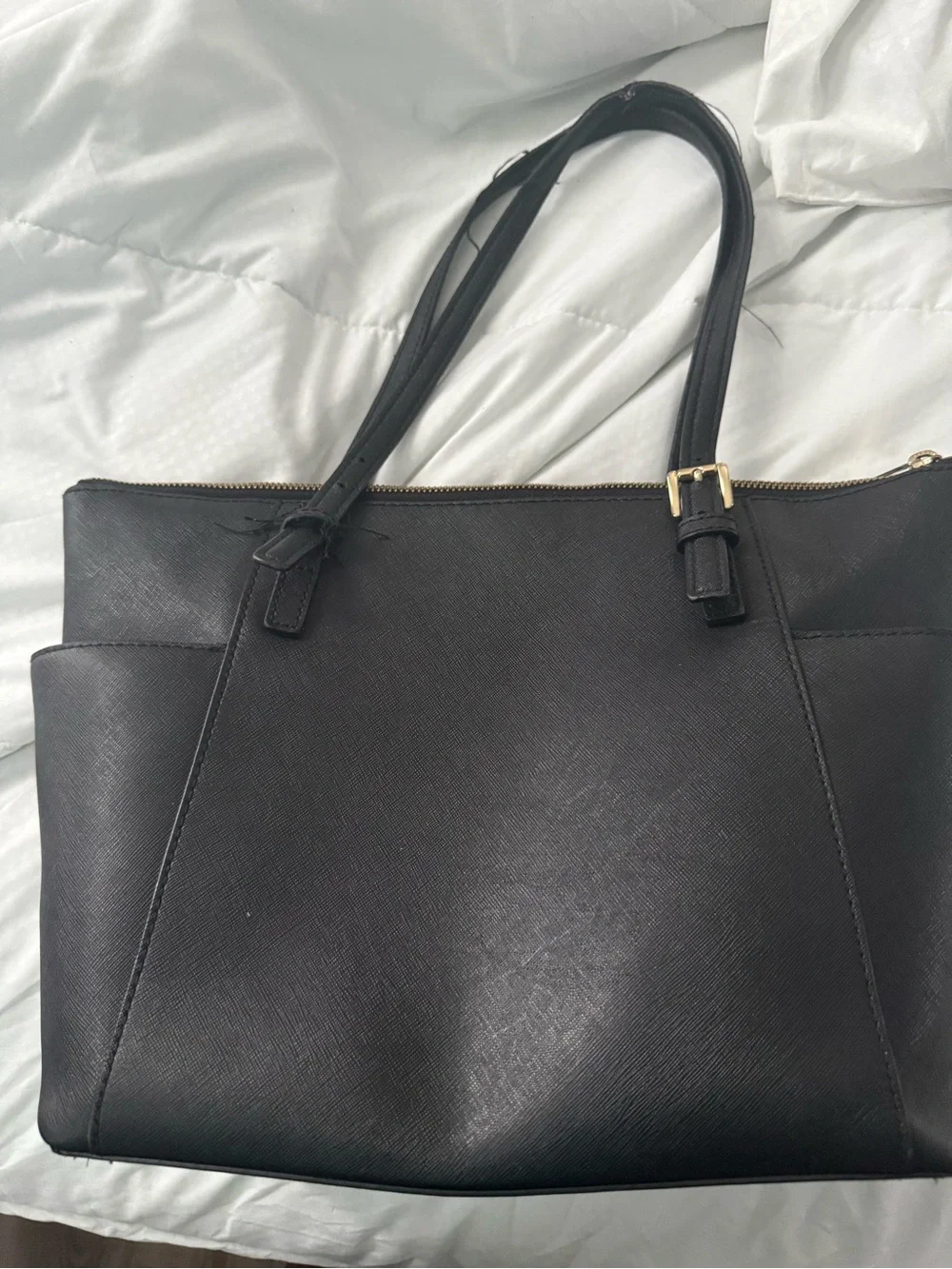 MICHAEL KORS Black Saffiano Tote with Gold Hardware. The straps are messed up